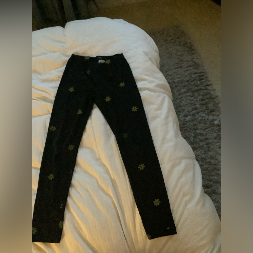 Black leggings with flowers.